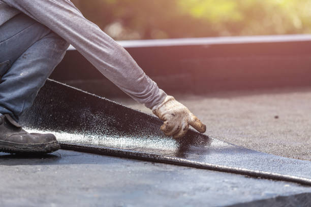 Professional Basement Waterproofing technician working in Mooreville, MS
